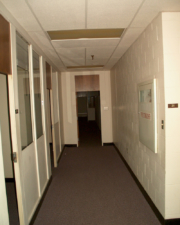 Witnesses have seen a woman wearing a yellow dress in this hallway.