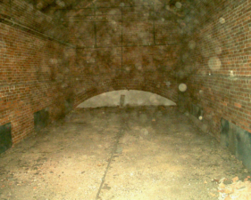 Orbs! Guess again. This is just dust kicked up from the attic's very dirty floor.