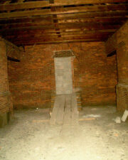 This blocked-over doorway once led to the center portion of the building that now houses the art museum.