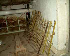 The old iron gates that once guarded the insane asylum's main driveway.