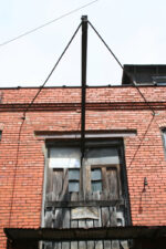 This exterior door allowed bulky items to be hoisted up to the second floor.