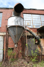 Some sort of vent/hopper? We've seen these around before, but are not entirely sure what they are.