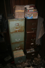 A couple of old filing cabinets full of paperwork.