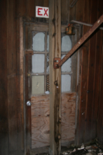 An old entry door near Town Street was blocked by a support beam.