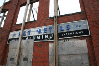 The building's address at 425 West Town Street can be seen above the boarded-over doorway.