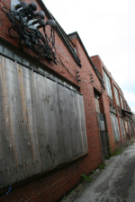 This portion of the building faces a small alley on the west side of the building.