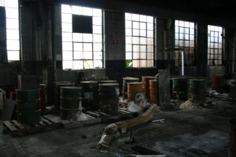 Several storage barrels sat along the east wall.