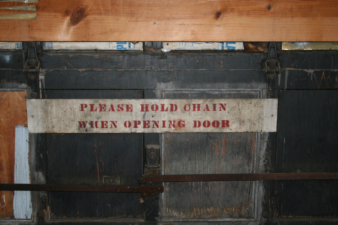 A sign on the rear overhead door.