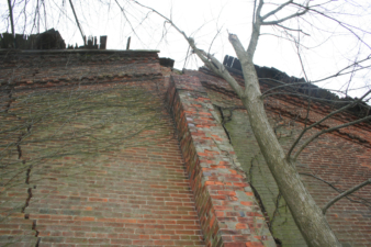 The large crack was on the back side of the church.