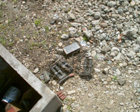Some kind of equipment was next to the toolbox.