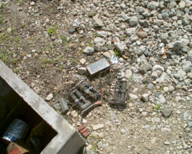 Some kind of equipment was next to the toolbox.