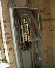 This breaker box next to the old desk looked to be newer.
