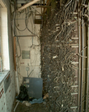 Lots of cut wires on the other side of the switchboard.
