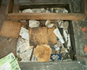 This trap door in the center contained old manuals, catalogs and brochures.