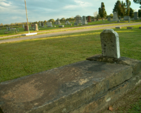 The tomb of Enola Artisa Compton. She died on January 13, 1879 at 15-years-old.