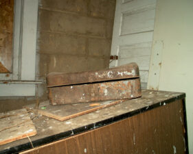 An old toolbox sat on the table.