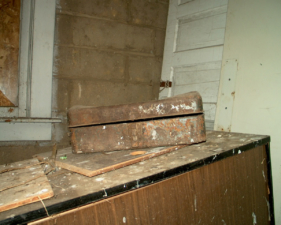 An old toolbox sat on the table.