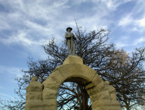 This statue of a Confederate soldier watched over the cemetery grounds.