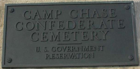 The main plaque outside the cemetery gate lists the cemetery as a U.S. Government Reservation.