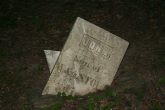 The tombstone for John Stout. He died at 20-years-old on May 30, 1856.