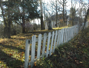 Most of the white fence in front of Clime Cemetery disappeared around 2006.