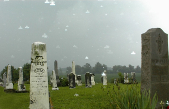 The tombstone for Emily McKinstrey is on the left. She died in 1860.