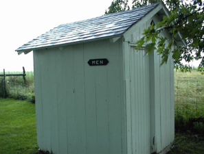 There were two outhouses behind the church. One for men and one for women.