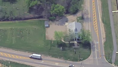 An aerial view of the church and adjacent cemetery a couple of years after our visit.