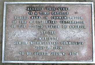 A time capsule was buried underneath this plaque on top of the mound.