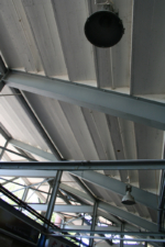 The concourse lighting and support beams.