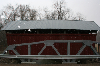 The southern face of the bridge along with a portion of the newer replacement bridge.