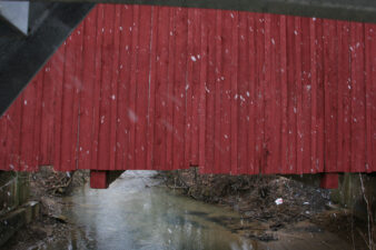 A couple of large beams that support the deck from beneath the bridge.