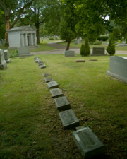 Snook's tombstone is in the foreground of this photo.