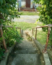An old stairway led down to the utility building.