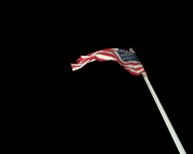 The American Flag flew high above the memorial.