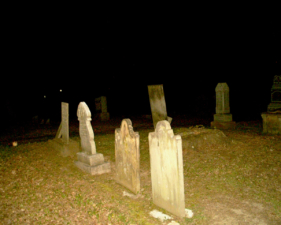 A row of older tombstones.