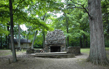 A large stone fireplace for gatherings at the park. We're unsure it there was once a building here.