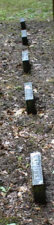 The graves of six men who died during the Indian attack. One of their tombstones was missing.