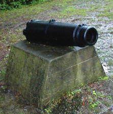 An old cannon at the edge of the battlefield.