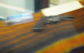 An old Civil War era pistol. The picture was taken through a glass case, please forgive the bad quality.
