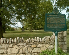 Franklinton Cemetery and its historical plaque.