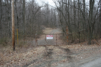 This back gate blocked a driveway at the nearest point to the facility's runway.
