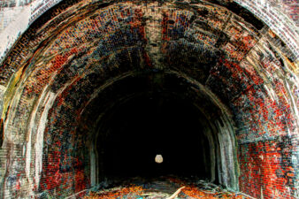 Peering into the depths of the tunnel.