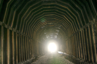 The center of the tunnel was just as large as the brick portion, but was made of timbers.