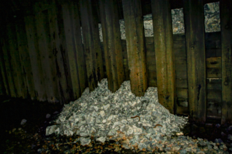 Some of the timbers had broken, allowing rock to fall onto the railbed.