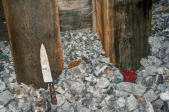 This large knife, along with a used candle, is among the strangest items we have found anywhere.