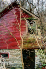 This red house was built on the hillside on the back of the property.