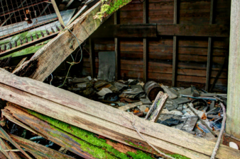 Inside the house was littered with trash and rubble.