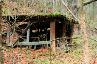 This shack was behind the large house and to the west of the red house.