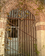 A large iron gate guarded the main entrance of the school.